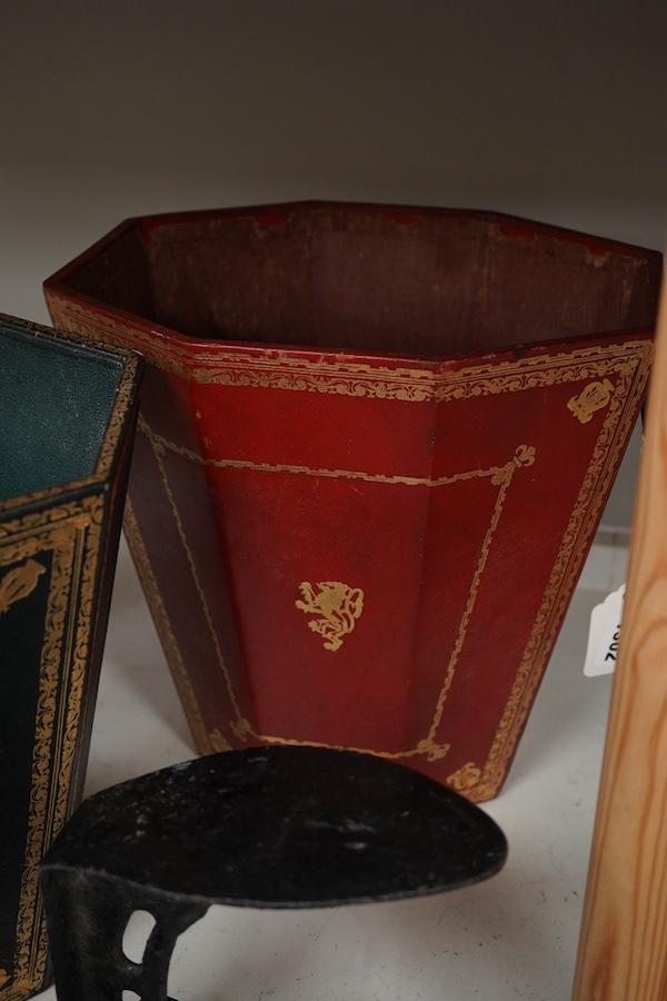 Two Italian gilt tooled leather waste paper baskets together with two Victorian cast iron doorstops and two boot scrapers, largest 29cm high